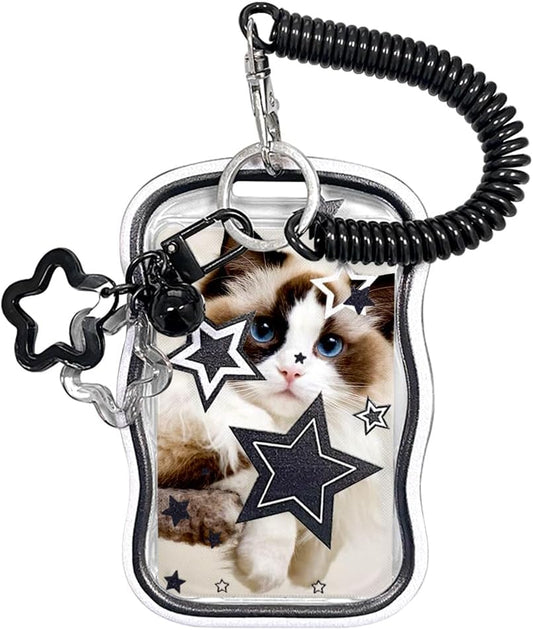 Black star-print photocard holder keychain with bell and star charms